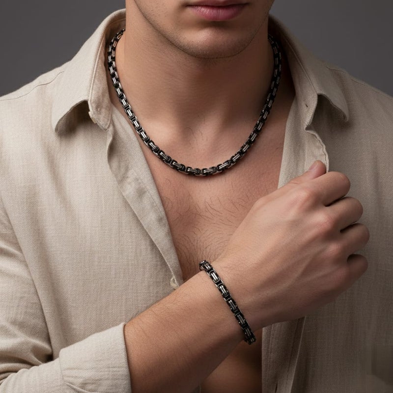 نصف ​طقم رجالي (سلسلة + سوار) مزيج بين اللون الأسود والفضي. ستانلس ستيل فخم، مقاوم للصدأ، وبتصميم عصري يجمع بين القوة والأناقة. - Image 2